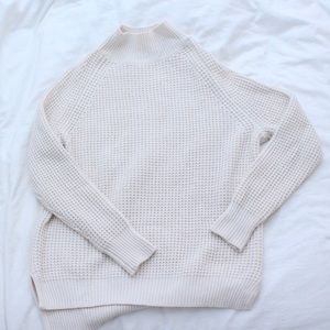 White/cream knitted turtleneck sweater